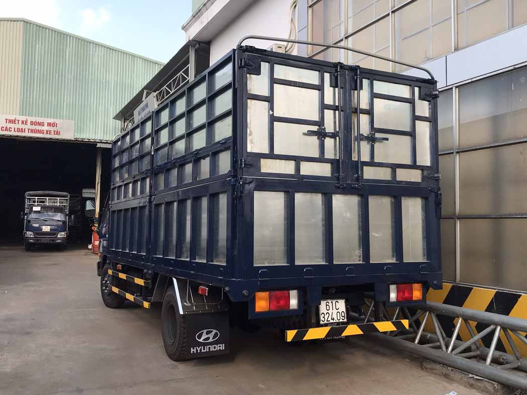 đóng thùng xe tải chở mùn cưa